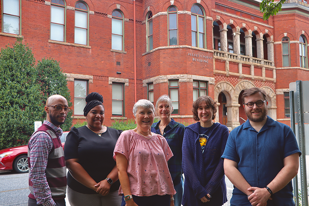 CASA advisors in front of the Foust Building, from L-R: Calvin Lowery, Ashley Tuck, Nancy Bucknall, Eleanor Cowen, Caitlin Saraphis, and Ryan Ridpath.